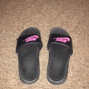 Pink & black Nike slide ons